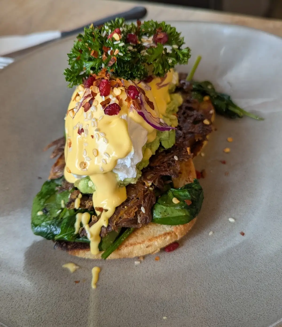 Eggs benedict with greens